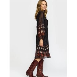 Sideprofil af 2-Biz kjole med elastik ved �rmerne og flot fald