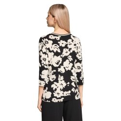 Bagside af m�nstret bluse med 3/4 �rmer p� model, der viser pasform og print bagp�