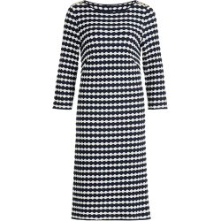 Navybl� og cremefarvet m�nstret jerseykjole med 3/4 �rmer fotograferet forfra.