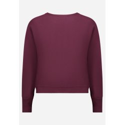 Bagsidevisning af ensfarvet bordeaux strikbluse