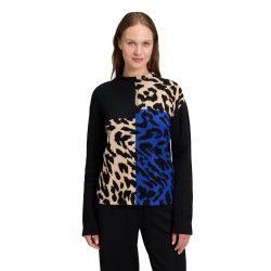 Model i sort strikbluse med kongebl�t og beige leopardm�nster, h�j hals og lange �rmer. Vist forfra